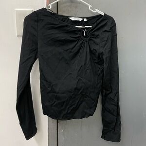 black blouse with 3/4 sleeves and metal accent